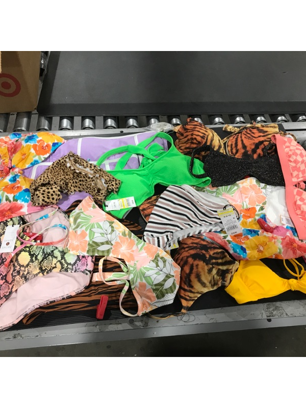 Photo 1 of A miscellaneous bag of women's swim suits. Containing 2 pieces. SIZES VARY. Some items still have red sensor tag. 