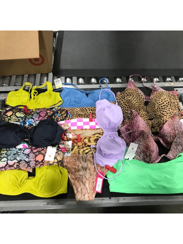 Photo 1 of A miscellaneous bag of women's swim suits. Containing 2 pieces. SIZES VARY. Some items still have red sensor tag. 