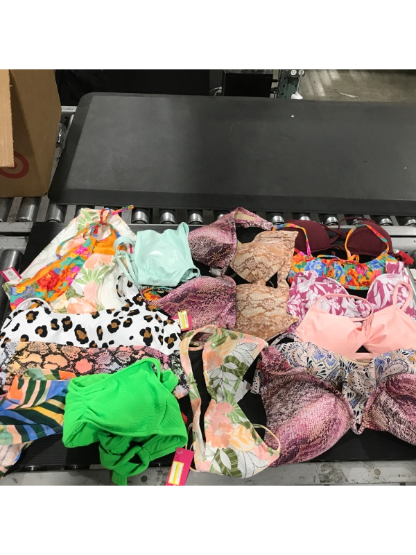 Photo 1 of A miscellaneous bag of women's swim suits. Containing 2 pieces. SIZES VARY. Some items still have red sensor tag. 