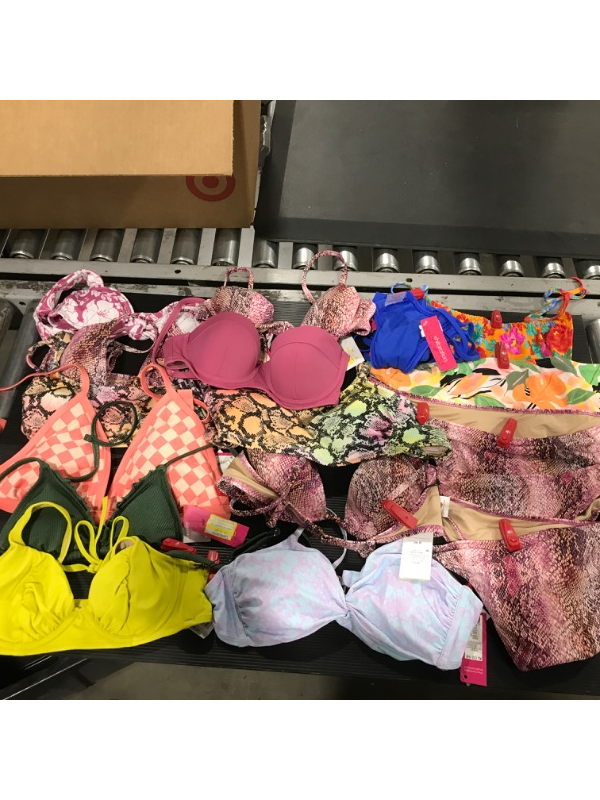 Photo 1 of A miscellaneous bag of women's swim suits. Containing 2 pieces. SIZES VARY. Some items still have red sensor tag. 