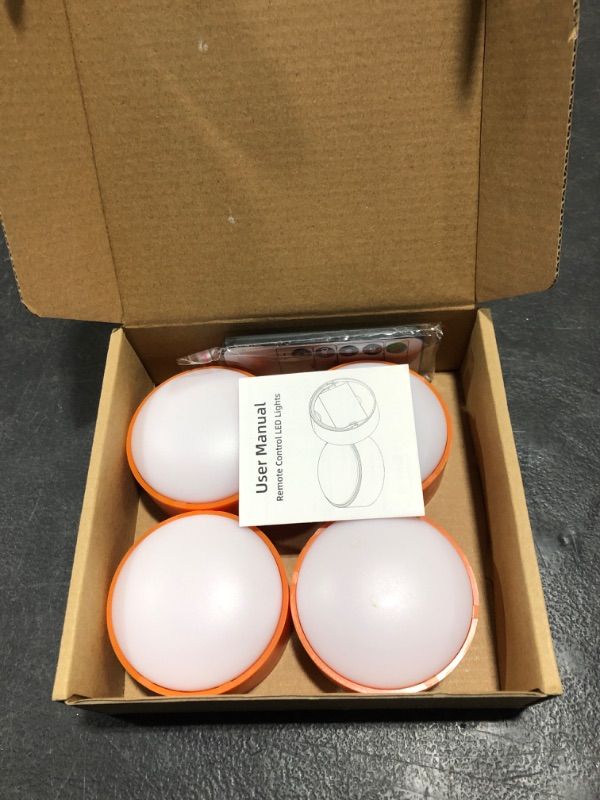 Photo 1 of 4 Pieces Halloween LED Pumpkin Lights Battery Operated Pumpkin Light with Remote Timer Pat Lights for Pumpkins Jack O Lantern LED Light Bright Flickering Flameless Candles for Halloween Decor(Orange)
