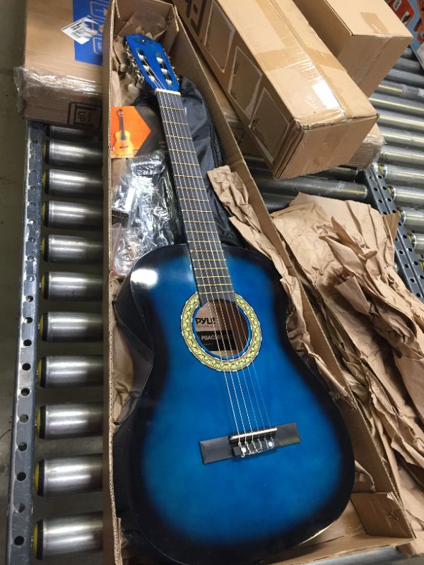 Photo 2 of Beginner 36” Classical Acoustic Guitar - 3/4 Junior Size 6 String Linden Wood Guitar w/ Gig Bag, Tuner, Nylon Strings, Picks, Strap, For Beginners, Adults - Pyle PGACLS82BLU (Blue Burst) Blue Fade
