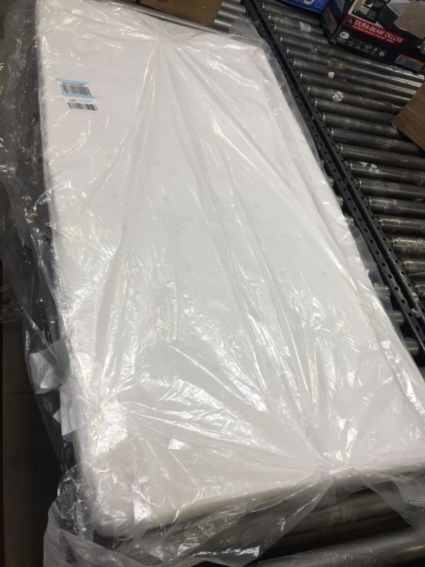 Photo 1 of Milliard 2-Inch Ventilated Memory Foam Crib and Toddler Bed Mattress Topper with Removable Waterproof 65-Percent Cotton Non-Slip Cover - 52" x 27" x 2"