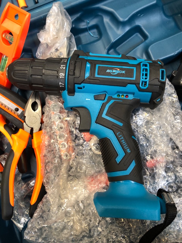 Photo 1 of AGMBOK Cordless Drill Power Set, 21V Cordless Drill Set - OUT OF BOX USED, AND THE HANDLE IS CRACKED 
