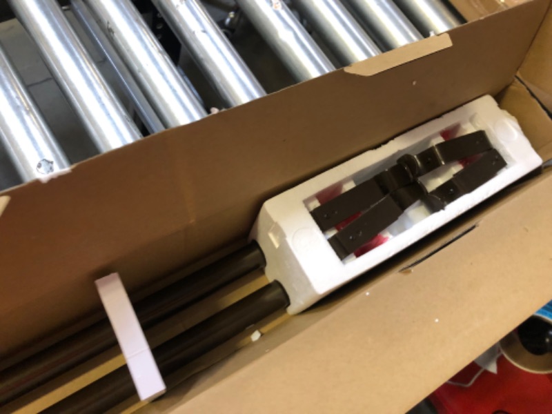 Photo 1 of 72"-144" curtain rods 
