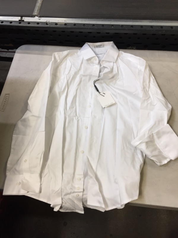 Photo 2 of Calvin Klein Boys' Long Sleeve Sateen Dress Shirt, Style with Buttoned Cuffs & Shirttail Hem 14 White