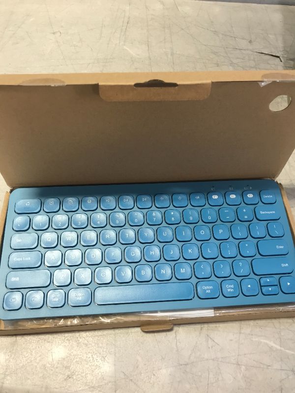 Photo 4 of Multi-Device Bluetooth Keyboard, PINKCAT Wireless Keyboard Compatible with Laptop/PC/Notebook/MacBook/Computer, Ultra-Thin Sleek Design for iPhone/iPad/iPad Mini/iPad Pro/iPad Air/Smart TV - (Blue) --- UNABLE TO FULLY TEST 
