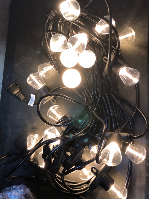 Photo 3 of Enbrighten 48 Ft. Black Bistro Integrated LED String Light [ USED] 
