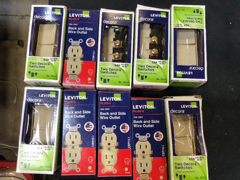 Photo 1 of 10 pack of switches and outlets sold as is 