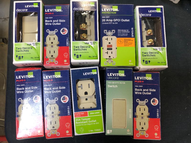 Photo 1 of 10 pack of switches and outlets sold as is 