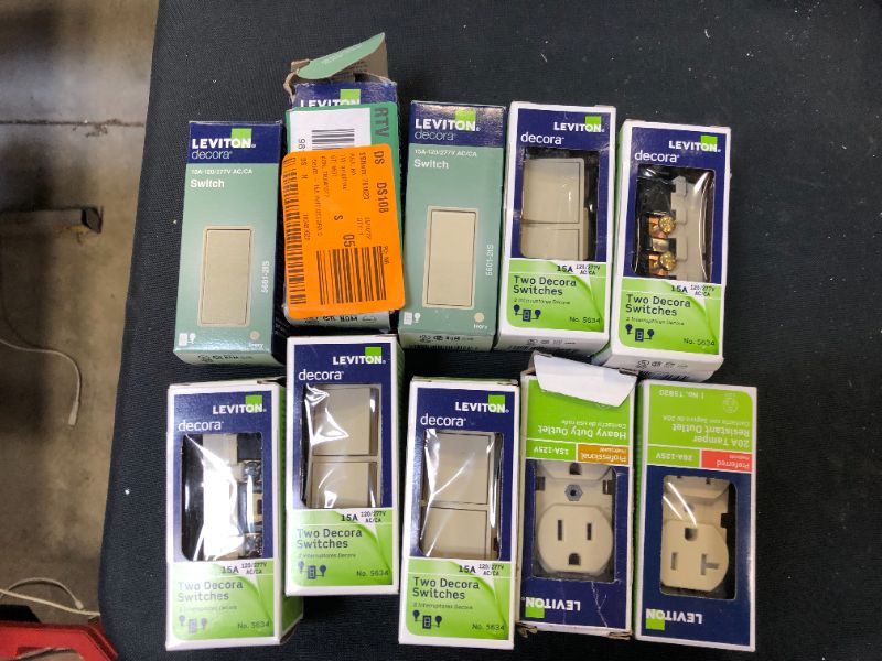 Photo 1 of 10 pack of switches and outlets sold as is 