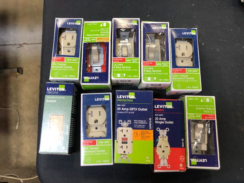 Photo 1 of 10 pack of switches and outlets sold as is 