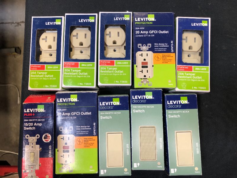 Photo 1 of 10 pack of switches and outlets sold as is 