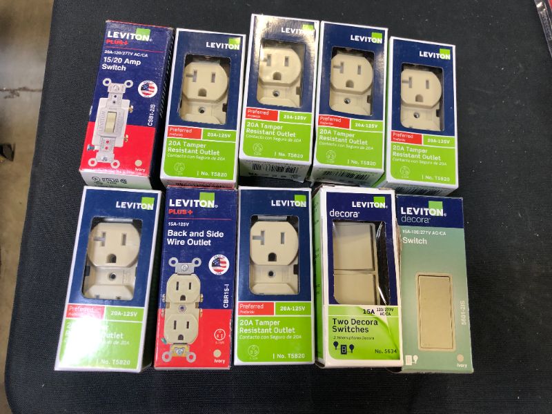 Photo 1 of 10 pack of switches and outlets sold as is 