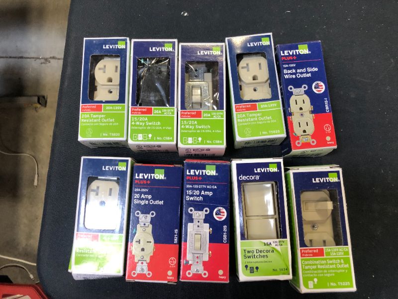 Photo 1 of 10 pack of switches and outlets sold as is 