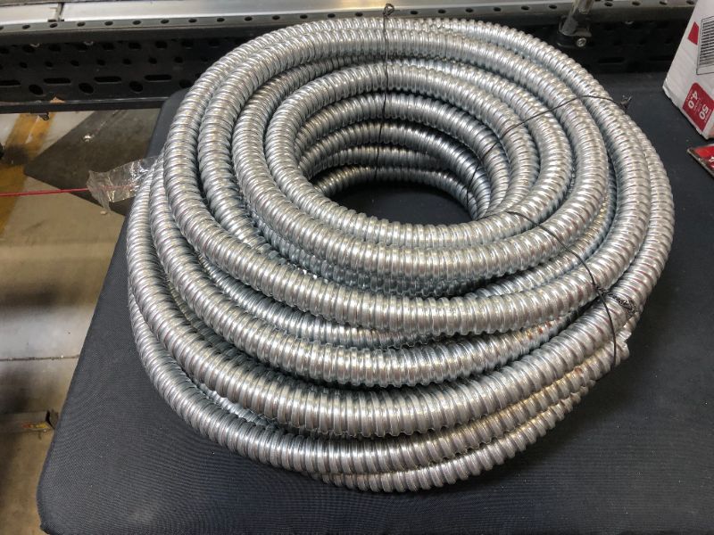 Photo 1 of 3/4" x 100" steel hose 