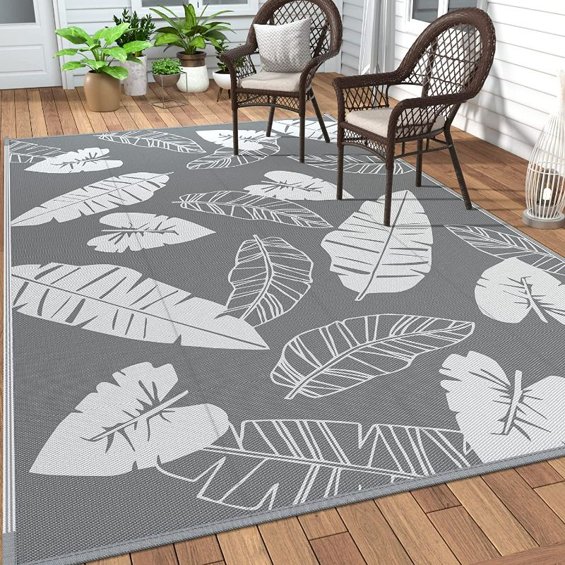 Photo 1 of GENIMO Outdoor Rug for Patios Clearance, 6'x9' Reversible Tropical Outdoor Decor Area Rugs, Plastic Straw Waterproof Carpet, Camping Mat, Rv, Porch, Deck, Camper, Balcony, White & Grey