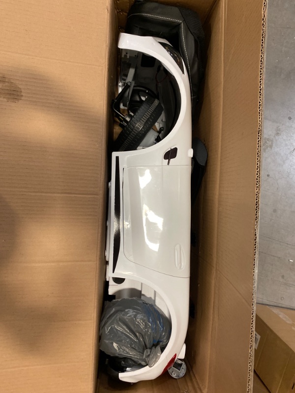 Photo 2 of Kids Ride On Electric Car Mercedes Benz AMG GTR Motorized Vehicles with Remote Control, 12V Battery Powered, Leather Seat, LED Lights, Wheel Suspension, Music, Horn, Portable Handle-White