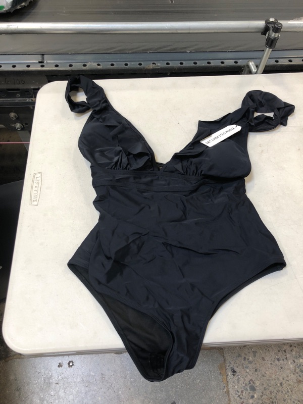 Photo 1 of  WOMENS TWO PIECE SWIMSUIT
 SIZE LARGE 