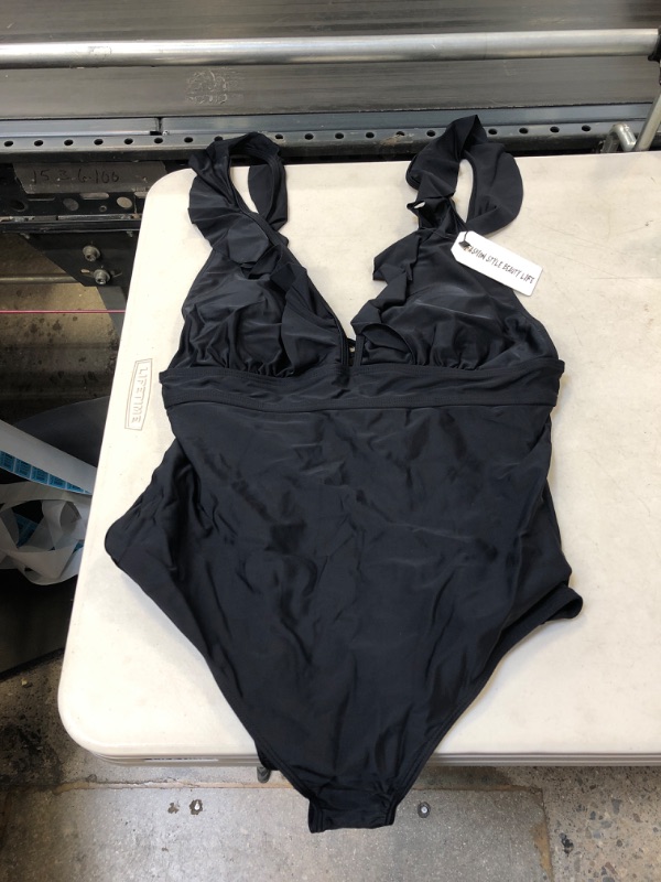 Photo 1 of 
WOMENS ONE PIECE SWIMSUIT
SIZE XL 