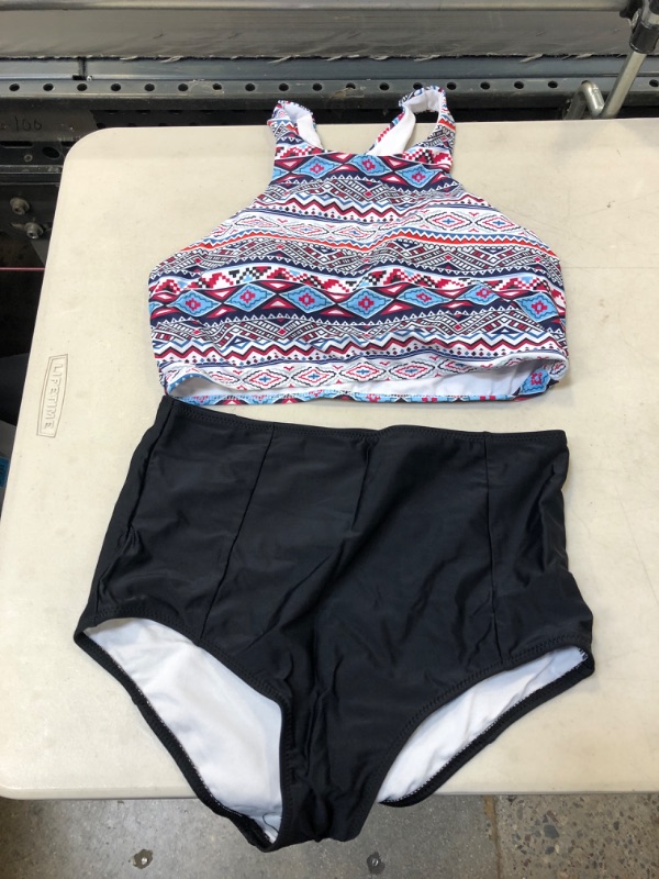 Photo 1 of  WOMENS TWO PIECE SWIMSUIT
 SIZE LARGE 