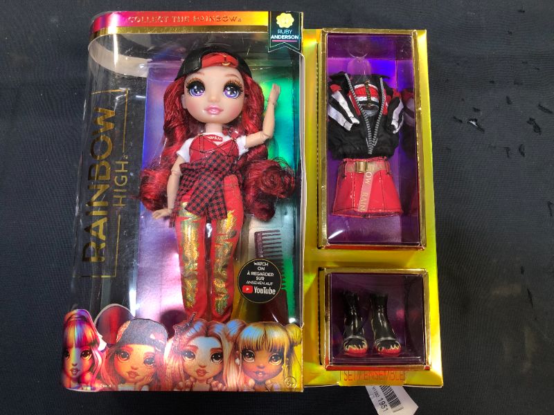 Photo 2 of Rainbow High Ruby Anderson - Red Clothes Fashion Doll with 2 Complete Mix & Match Outfits and Accessories, Toys for Kids 6 to 12 Years Old
