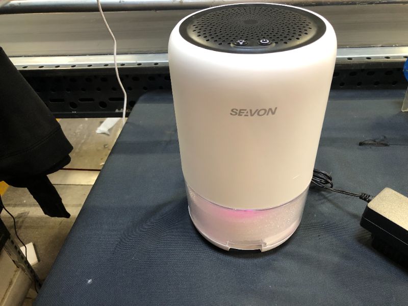 Photo 2 of SEAVON 35oz Dehumidifiers for Home, 2500 Cubic Feet (260 sq ft), Quiet Dehumidifier with Two Modes and 7 Color LED Lights, Portable Small Dehumidifiers for Bedroom Bathroom Basements Closet RV
