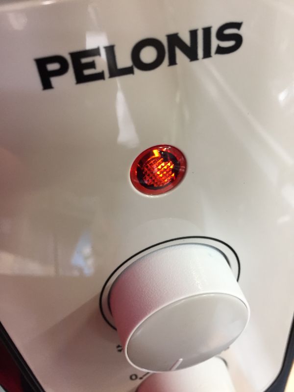 Photo 1 of 1,500-Watt Oil-Filled Radiant Electric Space Heater with Thermostat
