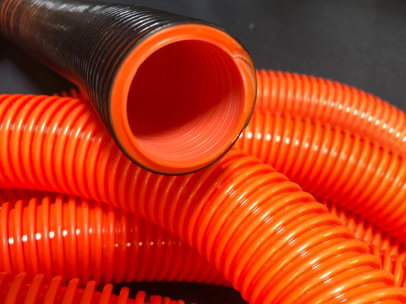 Photo 1 of (1" Dia. x 100 ft, Orange & Black ) HydroMaxx® Flexible Polyethylene Corrugated (PE) Split Tubing (Wire Loom)
