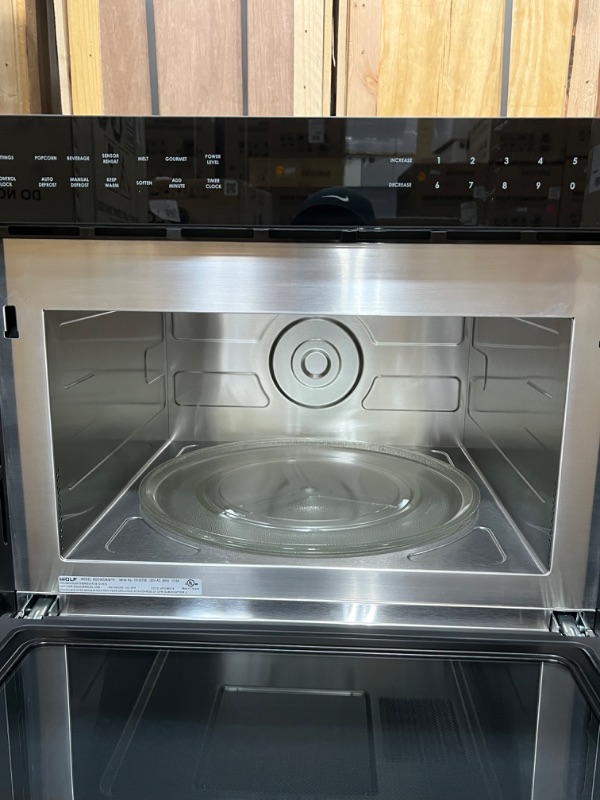 Photo 4 of WOLF BRAND 30" M Series Contemporary Drop-down Door Microwave Oven, Model # MDD30CM/B/TH *** ITEM HAS SMALL AMOUNT OF REMOVABLE ADHEDSIVE ON THE FRONT TOP SURFACE*** (OUT OF BOX)