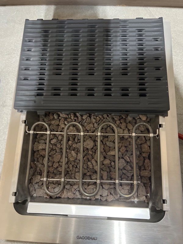 Photo 1 of Gaggenau Vario 400 Series VR414610
 15 Inch Electric Grill with 2 Grill Elements, Cast-Iron Grill Surface, 1500W Independent Elements, 12 Output Levels, 
 Illuminated Ring Control Knob, Safety Shut-Off, Lava Stone Container, and Grease Drip Tray +++OUT OF