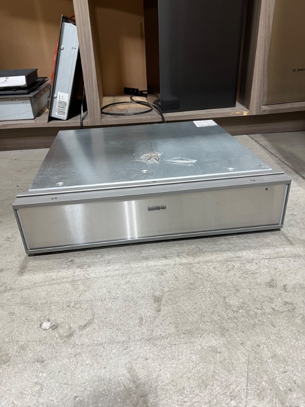 Photo 2 of Gaggenau 24 inch Warming Drawers, WS463710, 0.75 cu. ft. Capacity
  Convection Fan, 4 Temperature Levels, Proofing, Stainless Steel Interior, Glass Bottom, Handleless Design +++OUT OF BOX, ITEM HAS SCRATCHES AND DINGS +++