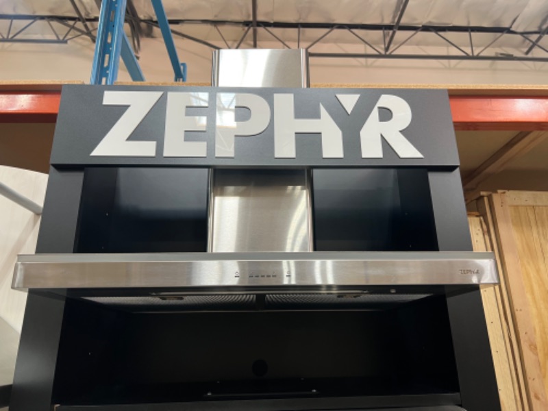 Photo 3 of Zephyr 200 - 600 CFM 30 Inch Wide Wall Mounted Range Hood from the Luce Series
, Model:ZLU-E30BS, +++ FLOOR DISPLAY, FUNCTIONAL, OUT OF BOX, ITEM HAS MINOR DINGS AND SCRATCHES +++