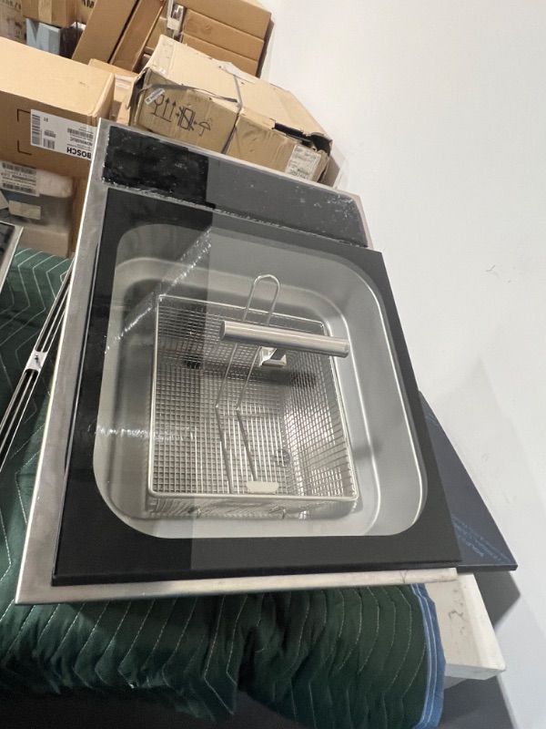 Photo 2 of WOLF 15 Inch Built-In Fryer Module with 2700-Watt Heating Element, 3 Dishwasher-Safe Wire Baskets, Melt Feature, Manual Locking Drain, Illuminated White LED Sliding Touch Controls and Low-Profile Stainless Steel Lid, MODEL FM15TS- 15" 
(OUT OF BOX) +++ TH