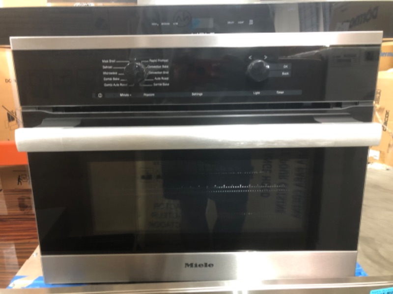 Photo 2 of Miele 24 Inch Speed Oven with 1.5 cu. ft. Capacity, 1,000 Watt Microwave, Rapid Preheat, DirectSelect Controls, Timer and PerfectClean Interior: Clean Touch Steel, PureLine Handle
