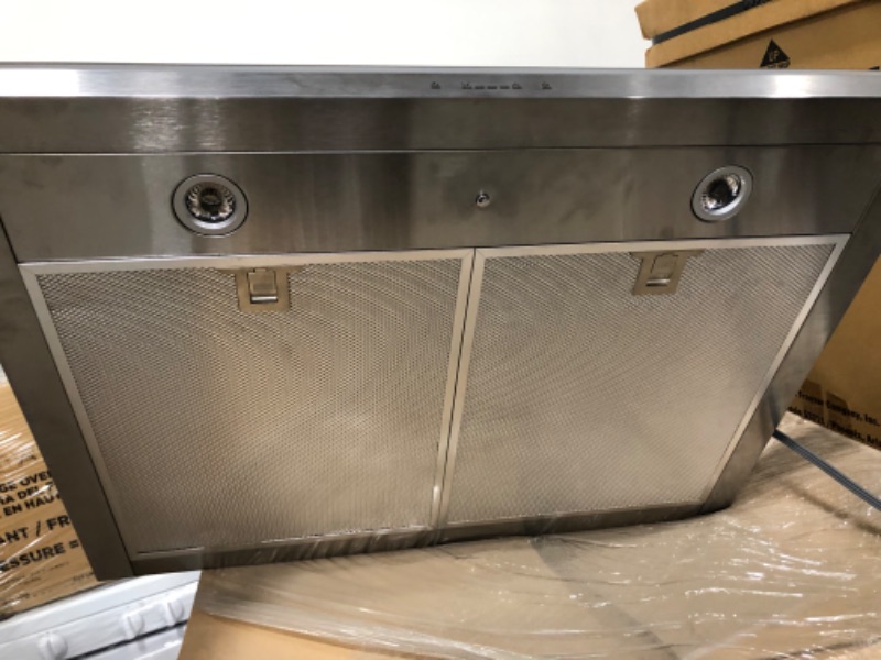 Photo 1 of Zephyr Europa Luce Series ZLUE30AS
30 Inch Wall Mount Chimney Hood with 600 CFM Internal Blower, 5 Speeds, Dishwasher Safe Aluminum Mesh Filters, ACT Technology, ICON Touch Controls, Dual Level Bloom LED Lighting, 3 Color Trim Lighting and Recirculating O