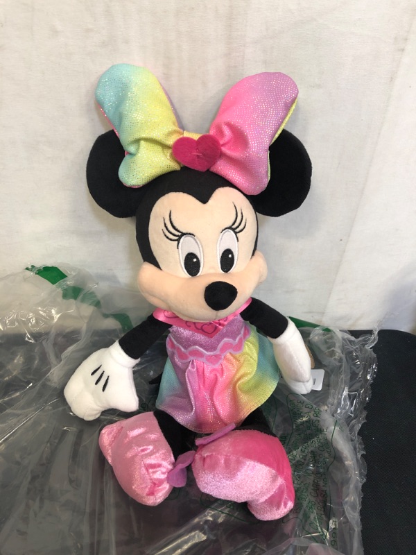 Photo 2 of Disney Junior Minnie Mouse Sparkle and Sing Minnie Mouse, 13 Inch Feature Plush with Lights and Sounds, by Just Play
