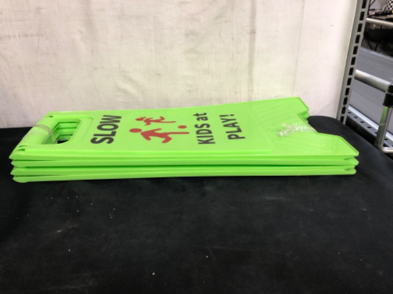 Photo 3 of CERLMLAND Slow Kids at Play! 2 pack Green Child - Safety Slow-Down-double-sided - signs , Black text and red graphics Easier to identify,Yard Signs for Schools,Neighborhoods,Park,Day Cares,Home Use for Street, Sidewalk,Driveway
