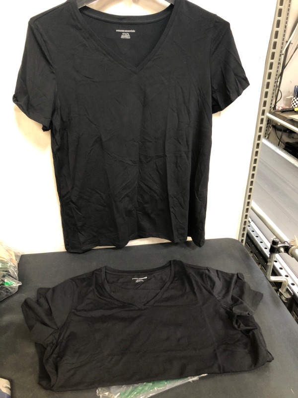 Photo 1 of WOMENS AMAZON BLACK TEES, SIZE XL 