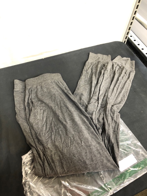 Photo 1 of WOMEN'S LOOSE GREY JOGGERS WITH POCKETS, SIZE TAG IS CUT OFF, APPEARS TO BE A SIZE S 