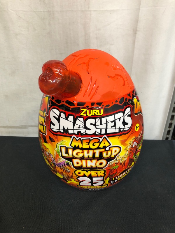 Photo 2 of Smashers Mega Light up Dino (with Over 25 Surprises!) by ZURU
