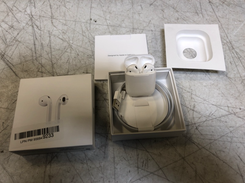 Photo 2 of AirPods with Charging Case 2ND GEN