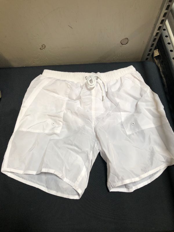 Photo 1 of MENS WHITE SHORTS SMALL