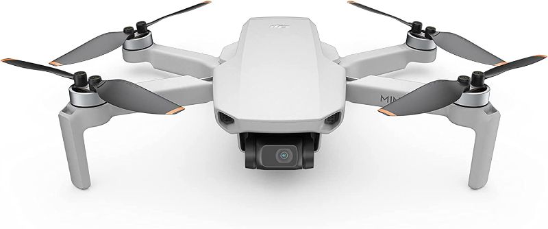 Photo 1 of DJI Mini SE - Camera Drone with 3-Axis Gimbal, 2.7K Camera, GPS, 30-min Flight Time, Reduced Weight, Less Than 0.55lbs / 249 gram Mini Drone, Improved Scale 5 Wind Resistance, Gray
