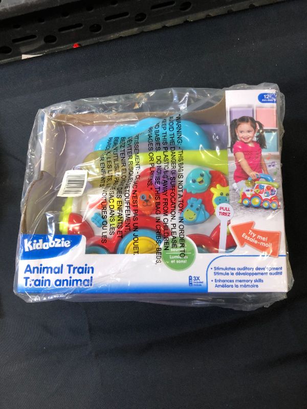 Photo 2 of Kidoozie Lights n' Sounds Animal Train, Makes Animal Sounds, Flashing Lights, Enhances Memory, for Children 12 Months and up, Multicolor
