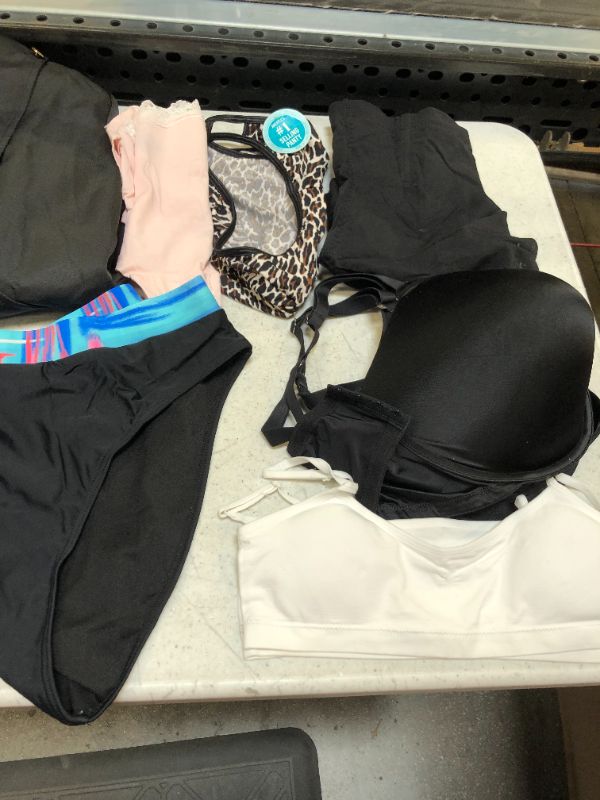 Photo 2 of BAG LOT OF 10 PIECES OF WOMEN CLOTHING --- DIFFERENT STYLES AND SIZES -- SOLD AS IS --- 