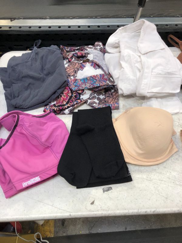 Photo 1 of BAG LOT OF 10 ITEMS OF WOMEN CLOTHING --- DIFFERENT STYLES AND SIZES ---SOLD AS IS-----