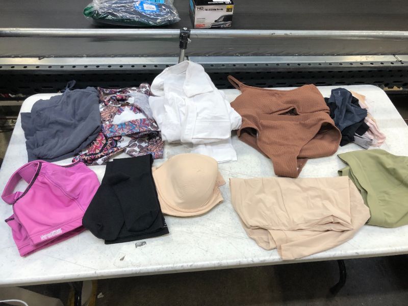 Photo 1 of BAG LOT OF 10 ITEMS OF WOMEN CLOTHING --- DIFFERENT STYLES AND SIZES ---SOLD AS IS-----