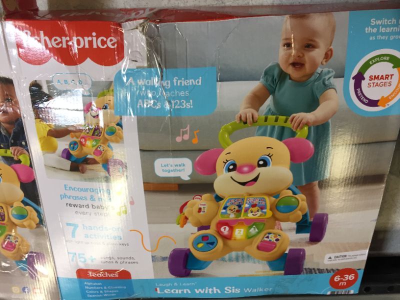 Photo 1 of Fisher-Price Laugh & Learn Smart Stages Learn with Sis Walker, Musical Walking Toy for Babies and Toddlers Ages 6 to 36 Months
