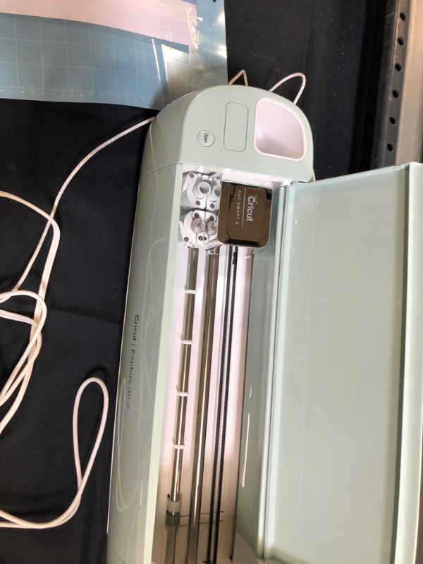 Photo 4 of Cricut Explore Air 2 - A DIY Cutting Machine for all Crafts, Create Customized Cards, Home Decor & More, Bluetooth Connectivity, Compatible with iOS, Android, Windows & Mac, Mint 
[unable to test for proper function / has marks and scuffs from previous us